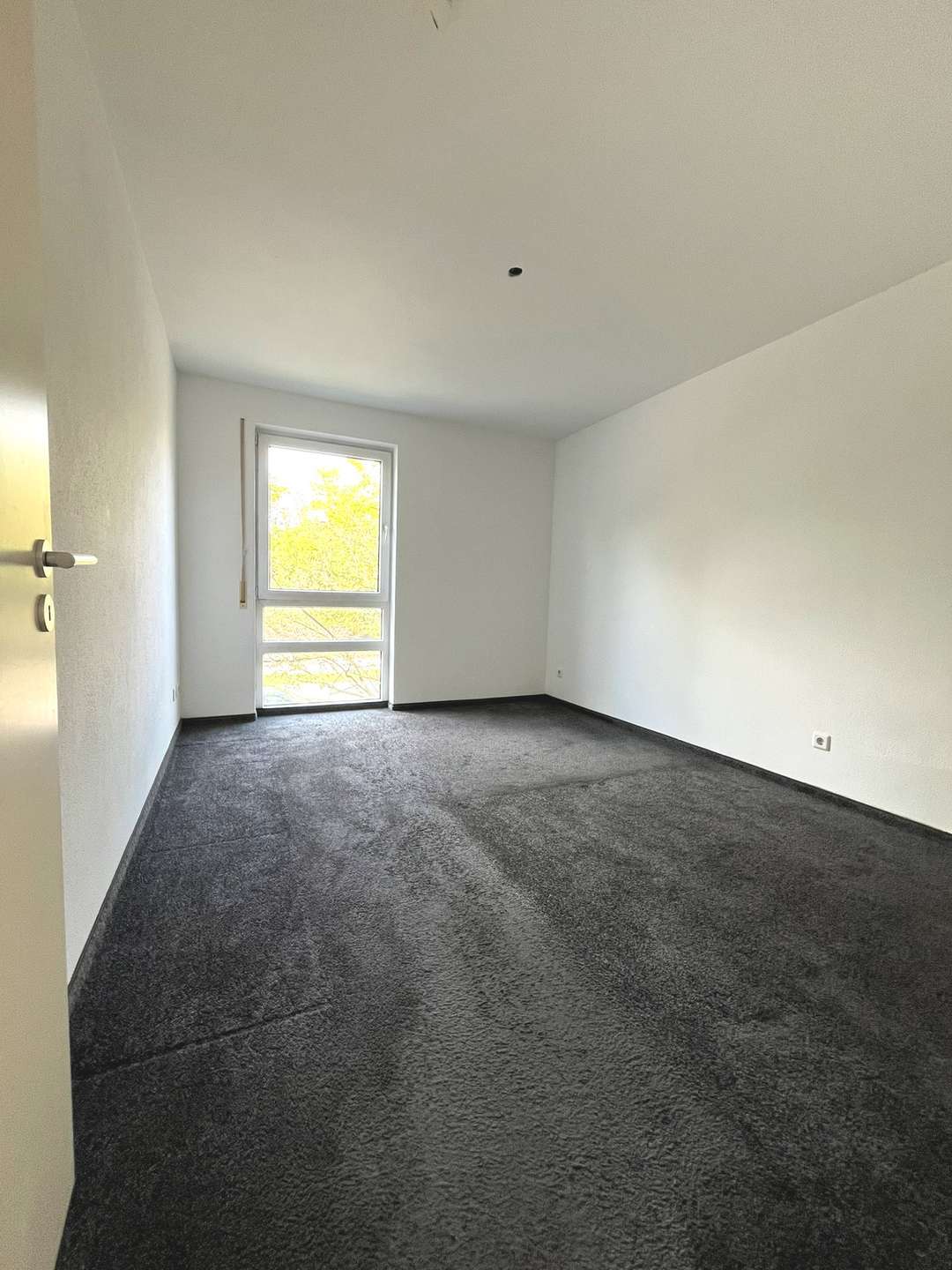 Schlafzimmer mit Teppichboden