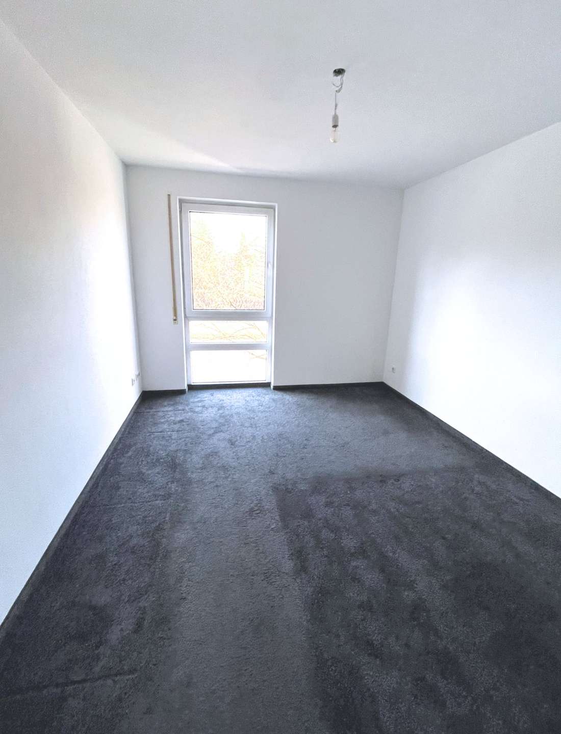 Schlafzimmer mit Teppichboden