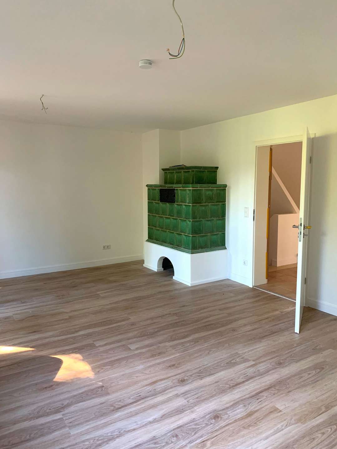 Wohnzimmer mit Kachelofen