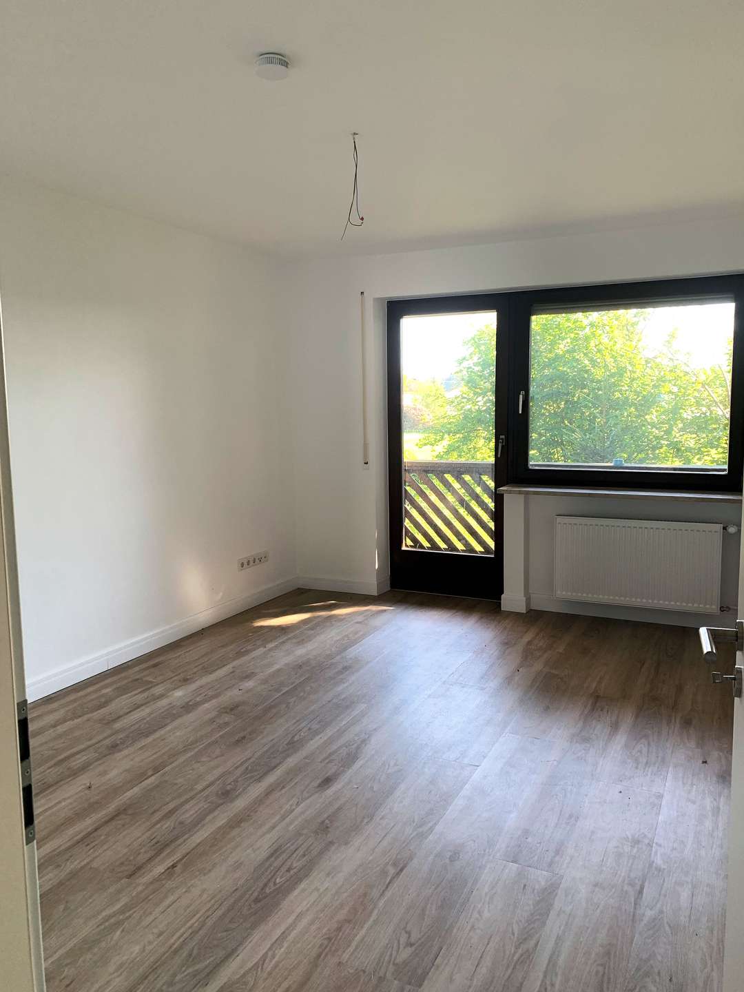 Schlafzimmer mit Balkonzugang