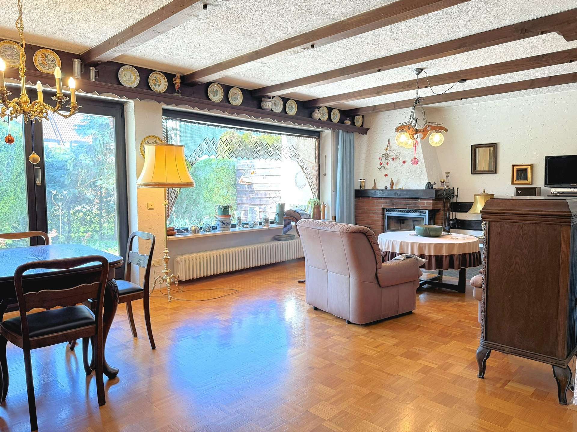 Wohnzimmer mit Zugang zur Terrasse